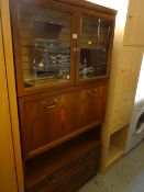 A vintage G-plan dark oak effect lounge unit