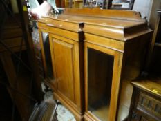 A vintage mahogany breakfront cabinet with carved railback & two glass door cupboards flanking