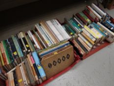 Two crates of various hardback & paperback books mainly reference & travel