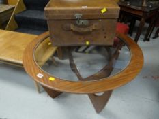 A vintage G-Plan teak circular glass top coffee table