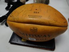 A 1984 Welsh squad signed rugby ball, signatures include Eddie Butler, Bleddyn Bowen, Gareth Roberts
