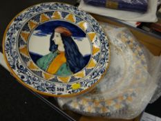 A pair of Italian character decorated chargers