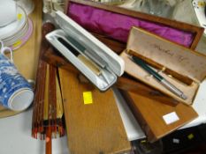 Three wooden storage boxes, Parker fountain pen & others, small parasol