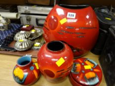 Two Poole pottery vases in 'African Sky' pattern together with a small round Poole vase & lidded