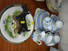 Tuscan china teaset, Doulton pottery dog HN1015 (damage) and two decorative wall plates
