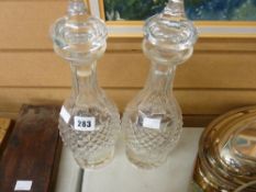 Pair of glass decanters with stoppers