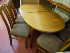 Excellent extending dining table by Mackintosh and set of four quality dining chairs