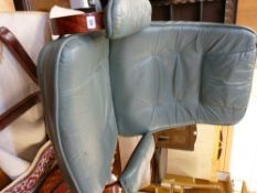 Green coloured leather effect swivel easy chair with reclining action