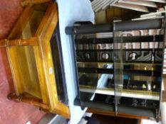 Octagonal glass topped coffee table, gilt framed bevelled wall mirror and a TV stand