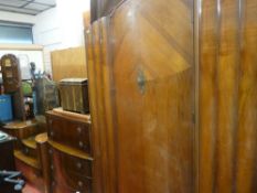 Early 20th Century bedroom suite comprising chest of five drawers, dressing table and single door