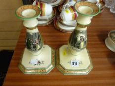 Pair of Adams candlesticks with 'Cries of London' transfer decoration