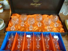 Two boxed sets of six cut crystal drinking glasses
