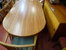 Mid Century dining suite of sideboard, table and four (three plus one) spindleback chairs