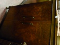 Neat walnut effect two door floorstanding cupboard with multi shelves