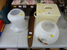 Tinware bread bin, two vintage glass lampshades and a large wooden boomerang