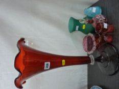 Large ruby glass trumpet vase, four items of cranberry glass etc