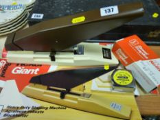 Rexel Giant office stapler, accompanying staples and a Stanley tape measure
