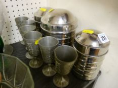 Three white metal provision containers and a set of six white metal goblets