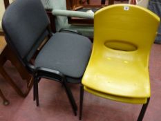 Two pairs of stacking chairs