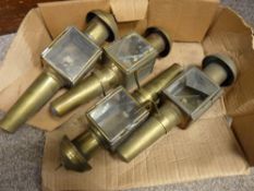 Four old brass street or similar lamps