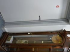 Modern mahogany and glass longcase clock