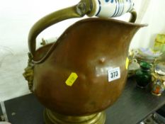 Copper helmet shaped coal scuttle