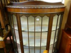 Good Edwardian mahogany bow front china display cabinet