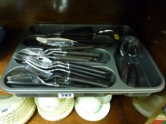 Parcel of ebony handled cutlery