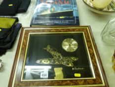 Timecraft horological collage of a spitfire with Quartz clock and a book titled 'Titanic, An