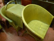 Two Lloyd loom style armchairs and a twin handled linen basket