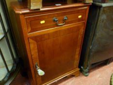 Crossbanded yew wood side cabinet with single drawer and door