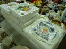 Selection of boxed collector's wall plates