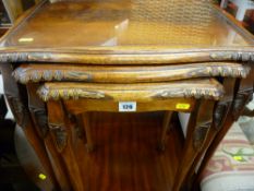 Three reproduction mahogany glass topped side tables