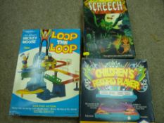 Boxed 'Mickey Mouse Loop The Loop', a Parker boxed 'Screech' and a Chad Valley boxed children's