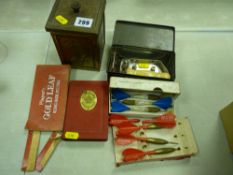 Brass 1953 tea caddy, parcel of darts and a savings bank money box