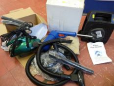 Sink unblocker, a small hand held Coopers mini vacuum cleaner and a 5 metre extension cable reel E/