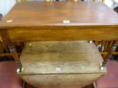 Edwardian mahogany side table on turned supports with brass cup and white pot castors
