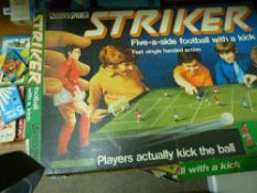 Boxed 'Striker' five-a-side football game by Parker and sundry packs of playing cards