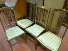 Four Edwardian inlaid mahogany salon chairs