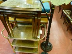 Reproduction walnut set of three glass topped tables, a barley twist standard lamp and shade with