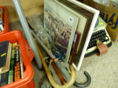 Three photographic prints and a selection of walking canes and umbrellas etc