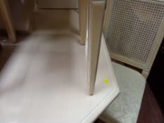 Modern limed oak effect extending dining table and six chairs with upholstered seats and cane work