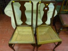 Pair of circa 1900 mahogany side chairs with cane work seats