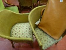 Two Lloyd loom style armchairs with a single item of vintage luggage