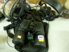 Pair of 24x50 zoom binoculars and two pairs of headphones