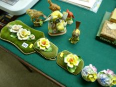 Collection of bird and floral ornamental pottery