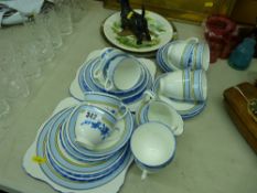 Tuscan china floral decorated teaset, two decorative wall plates and a pottery dog