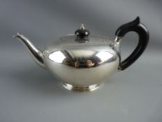 A WILLIAM IV SILVER TEAPOT of squat globular form with ebonized finial and handle, London 1831,