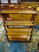A VICTORIAN MAHOGANY FOUR SHELF WHATNOT with fretwork top rail, barley twist shelf dividers and