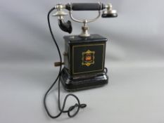 JYDSK TELEFON, black japanned case with gilt decoration, side crank and cradled ear and mouthpiece